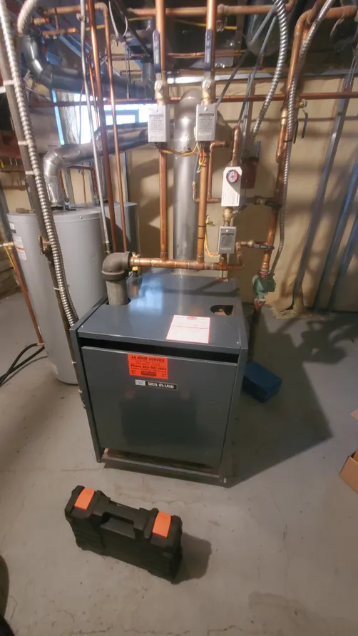 Weil-McLain boiler with new copper piping installed by Midland Heating & Cooling