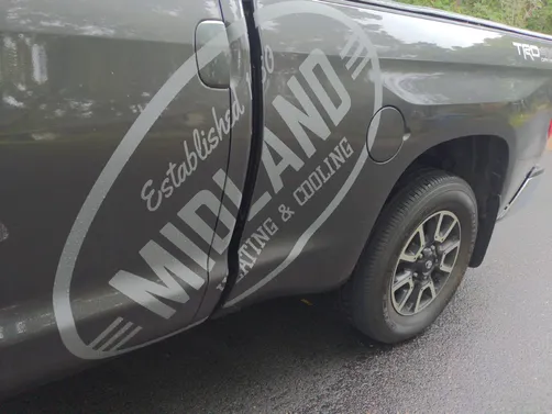 Midland Heating & Cooling branded service truck