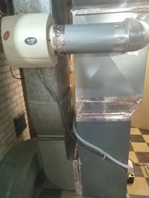 Furnace install with an Aprilaire humidifier and sheet-metal supply plenum