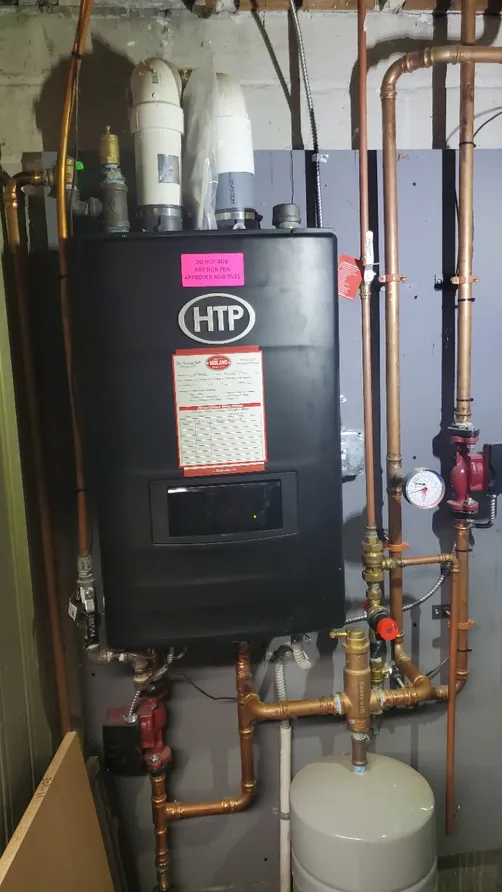 HTP high-efficiency boiler with copper near-boiler piping installed by Midland Heating & Cooling