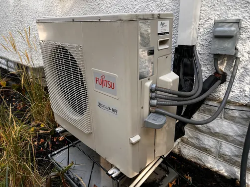 Fujitsu ductless mini-split outdoor unit installed at a Twin Cities home
