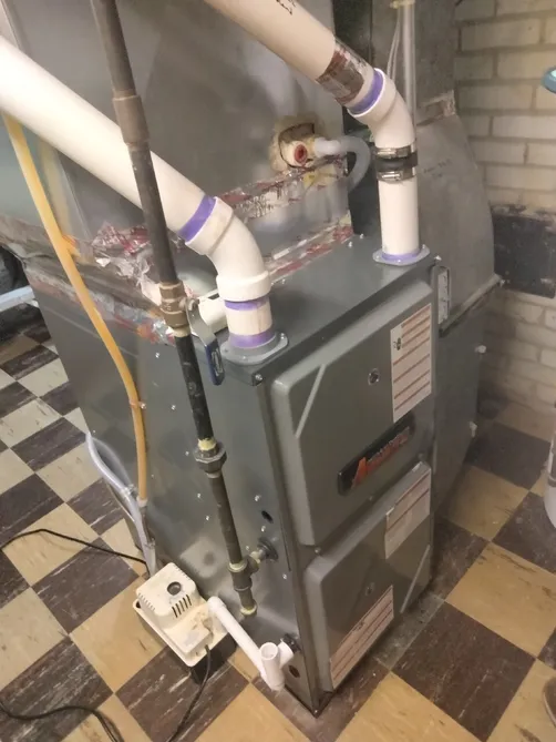 Amana furnace with new supply and return plenum sheet metal