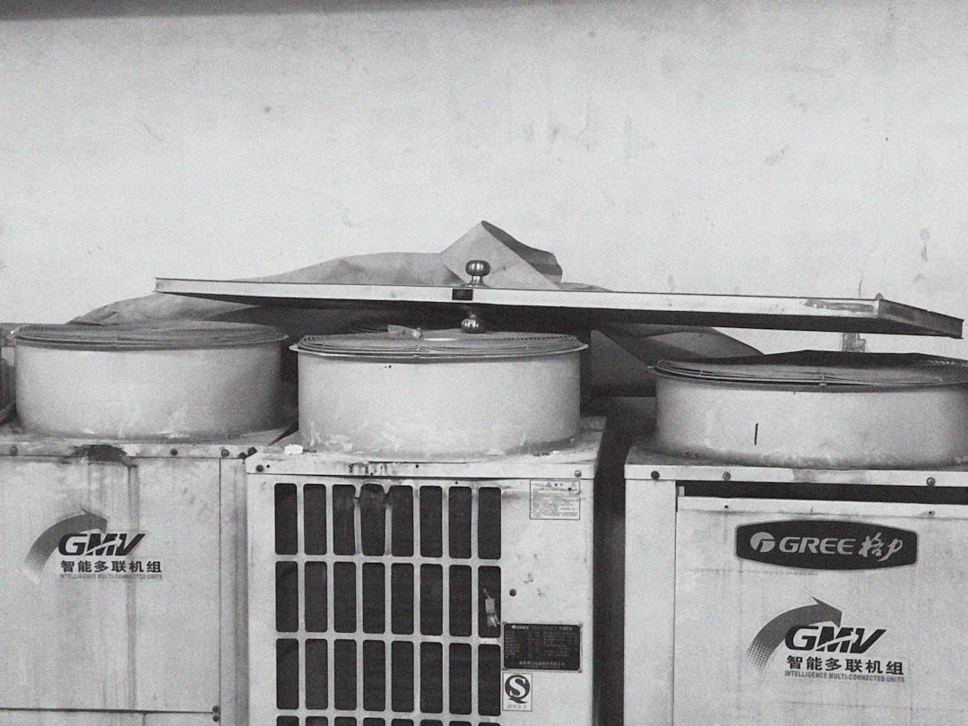 high-efficiency central air conditioner in a Minneapolis backyard during summer